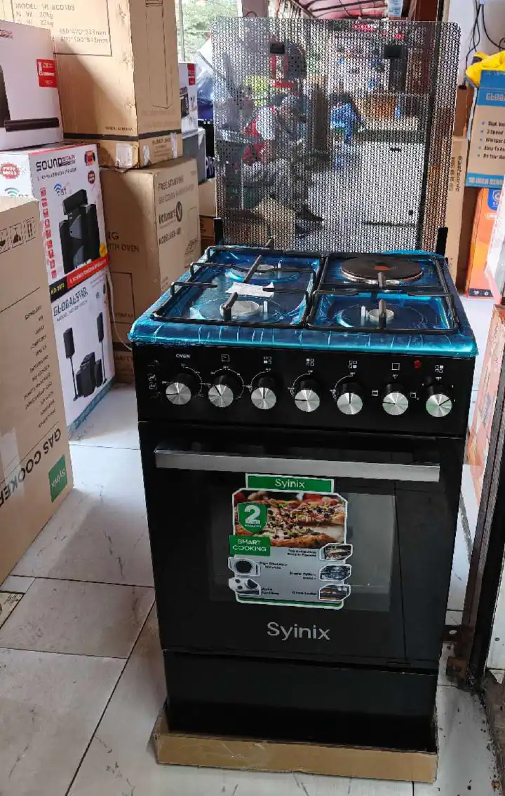Syinix 50by 50 Standing Cooker With Electric Oven, Auto ignition, jet valves, rapid hotplate, oven grill/rotisserie fork, tempered glass top lid, oven lamp &amp; timer.